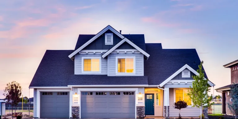 Light Grey House Black Garage Door