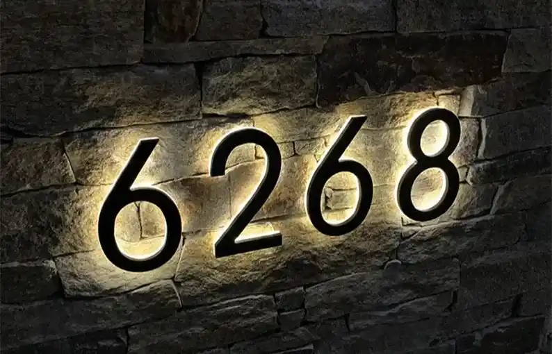 Modern lighted house numbers: Hardwired vs. battery-powered options
